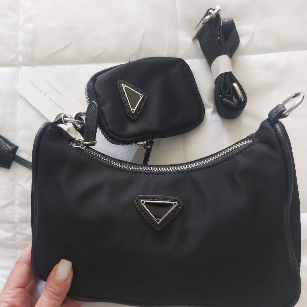 Brand new never worn on box Women's black clutch